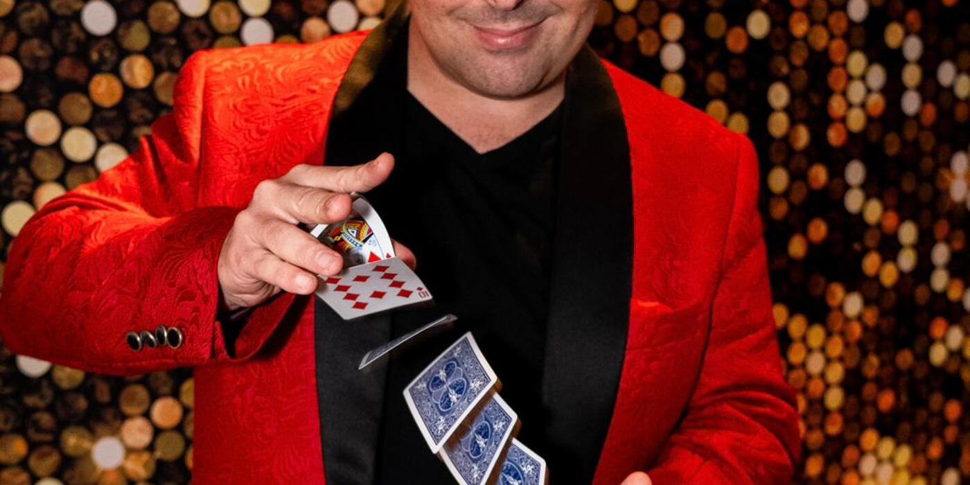John Messina performing the silk and rose illusion at a Sydney corporate event